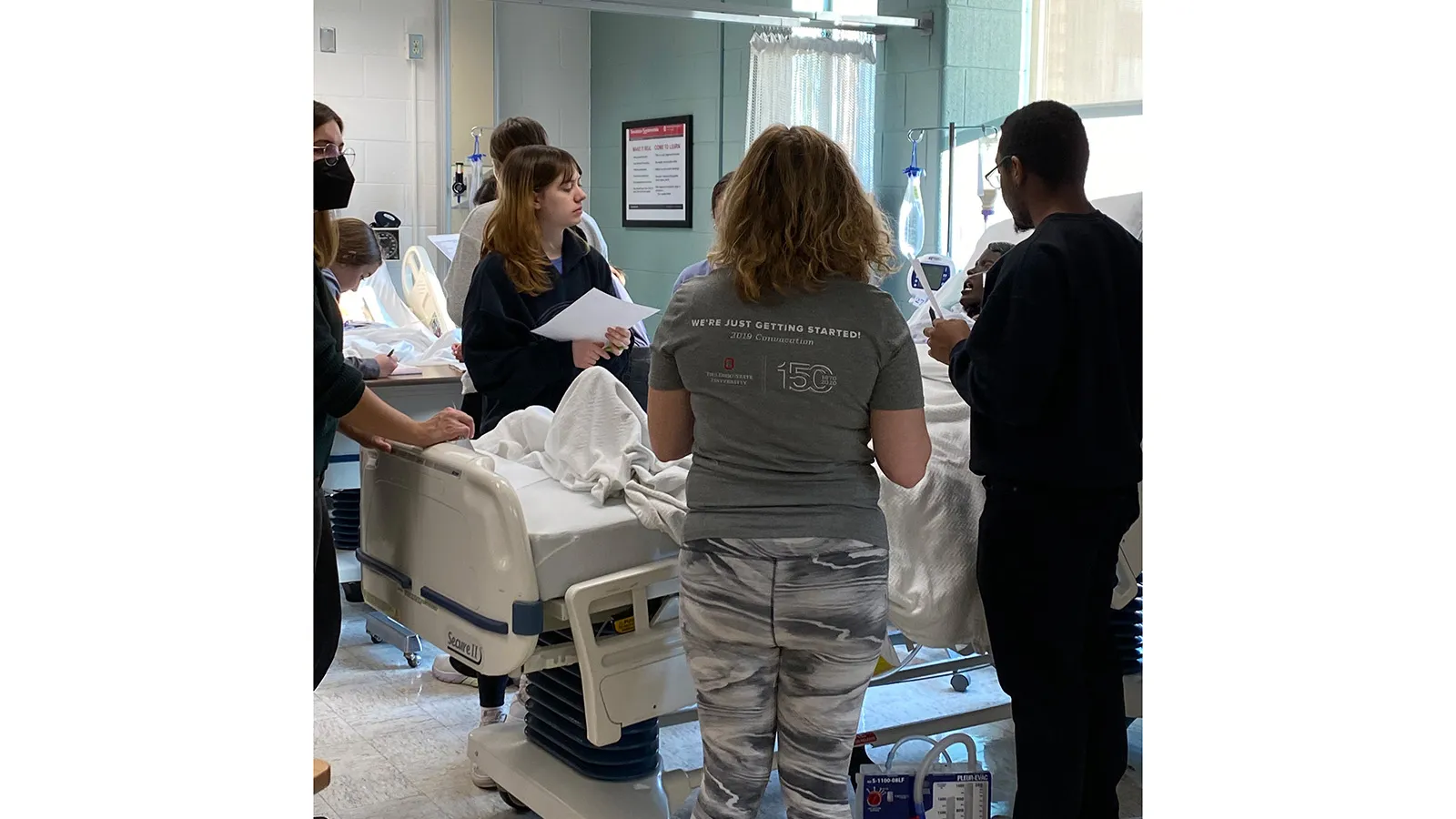 students with mock patient