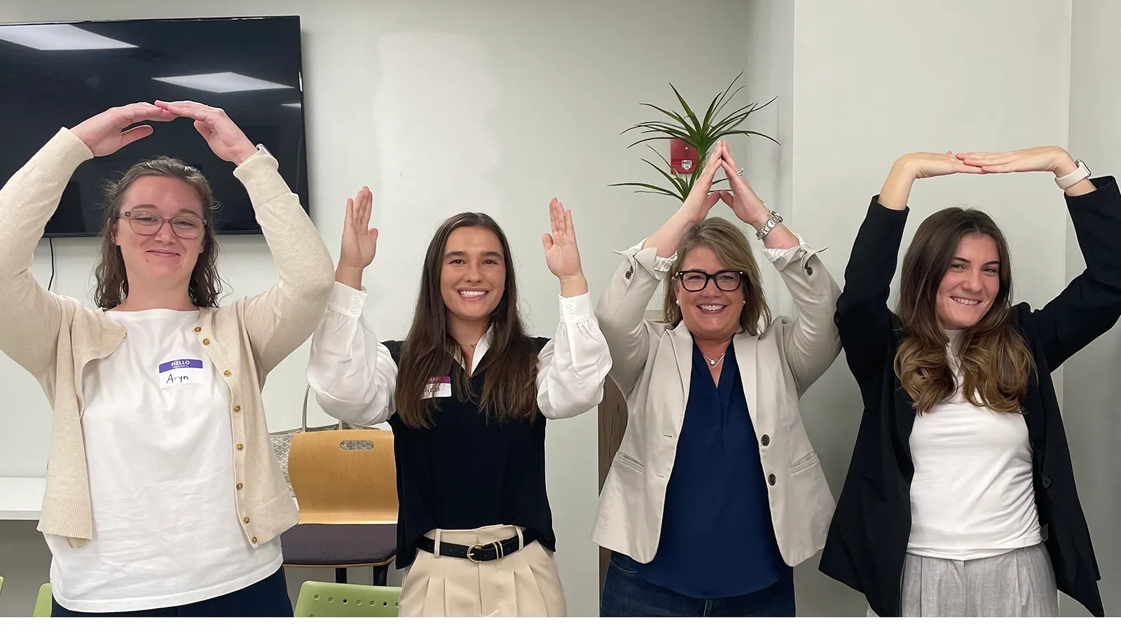 Aryn Robinson, Eliza Zweizig, Jen Brello, and Sami Shaffer in O-H-I-O pose